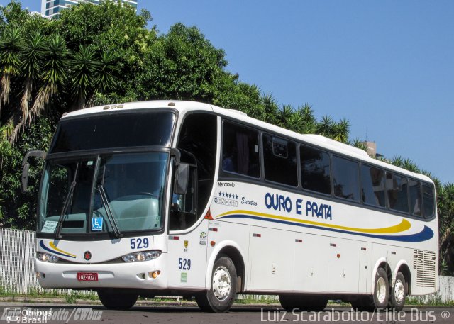 Viação Ouro e Prata 529 na cidade de Curitiba, Paraná, Brasil, por Luiz Scarabotto . Número da foto: #3776175.